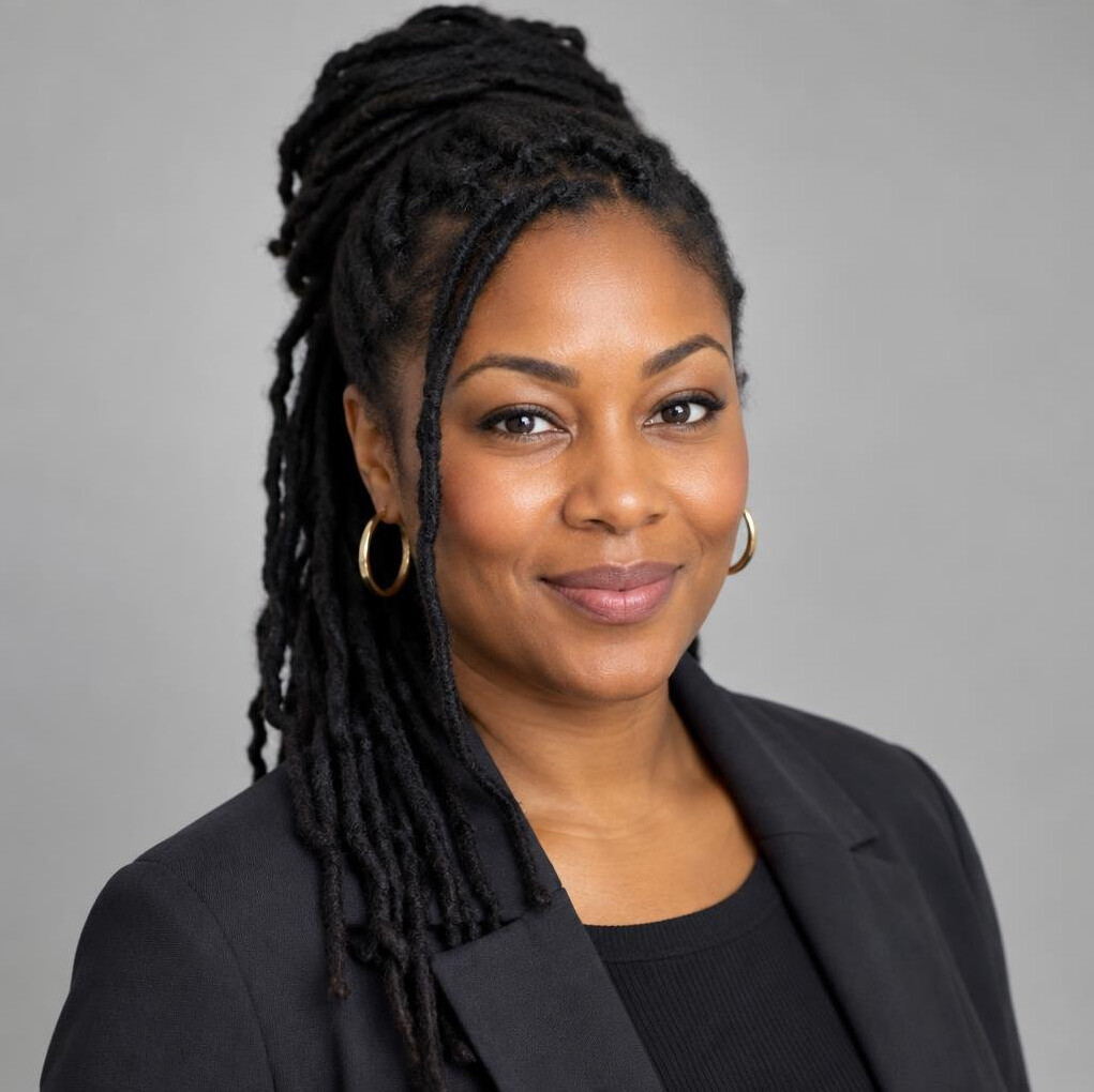 Black British woman in her thirties, camera operation instructor