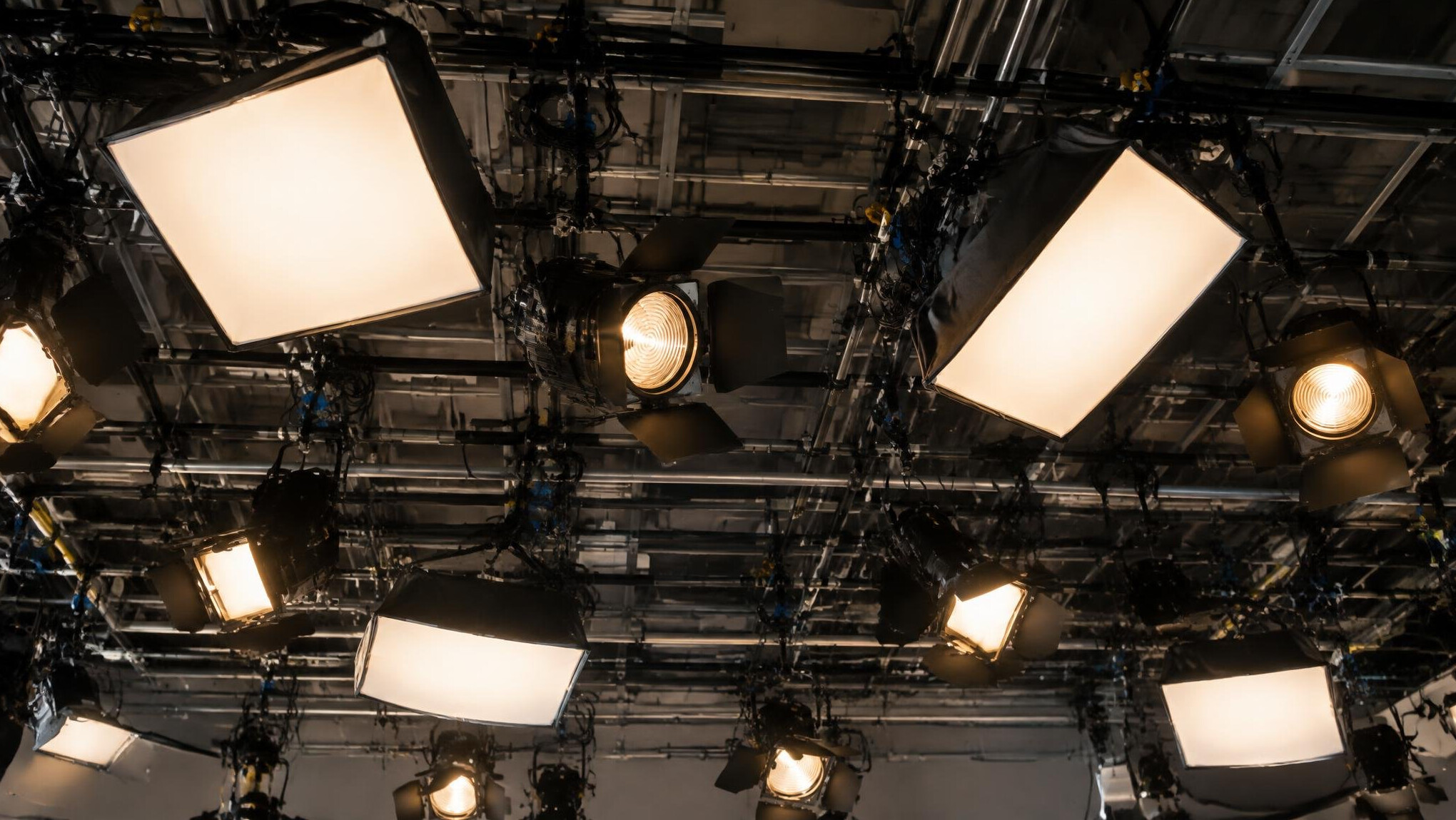 Overhead studio lighting rig with softbox lights